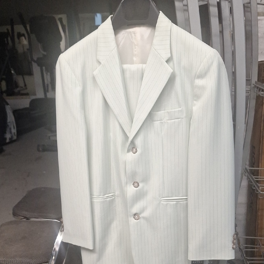 Boys Pinstripe light Green Three-Button Suit. Pants And Jacket